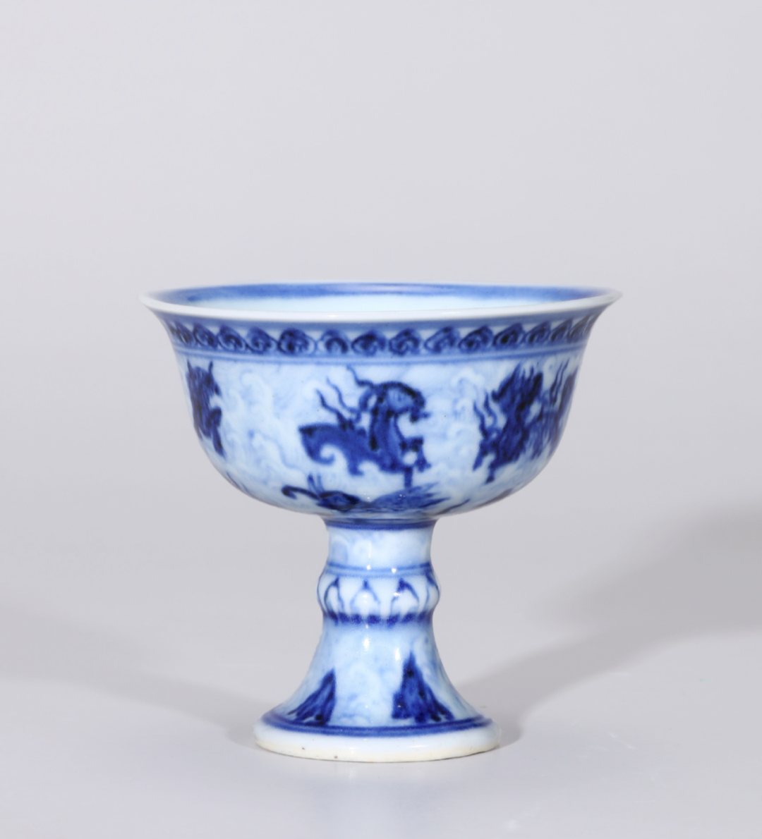 Ming Xuande blue and white Sanskrit sea water monster pattern goblet
