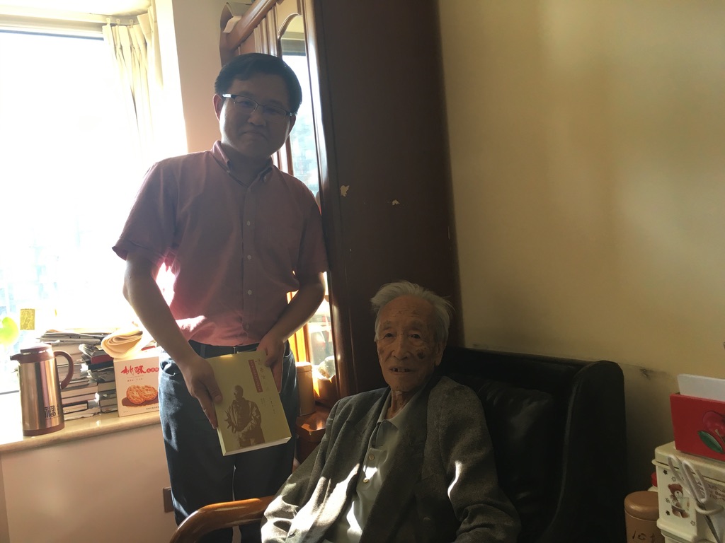 In 2018, the author of this article (left) visited Mr. Xie with the newly published